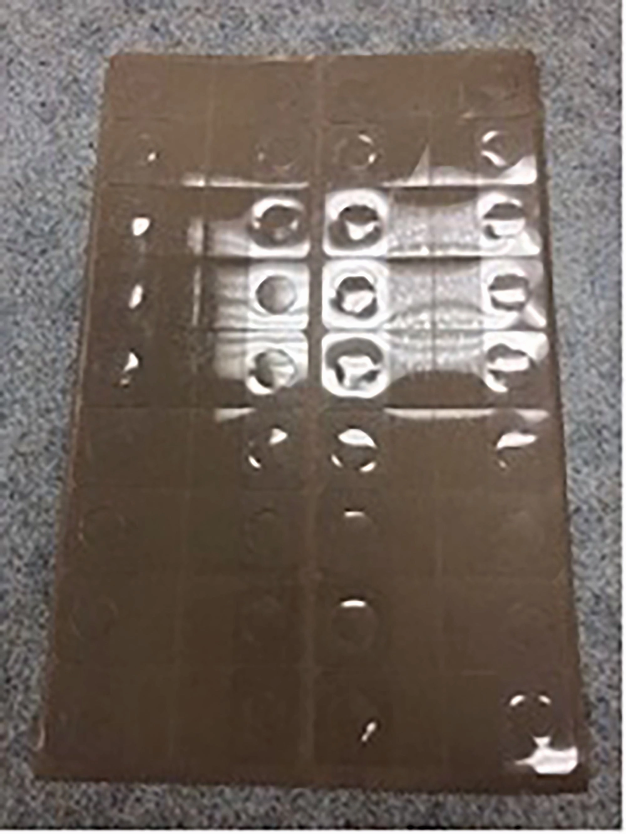 Merchandising Fixture - Adhesive Hang Tabs Sheet 975230