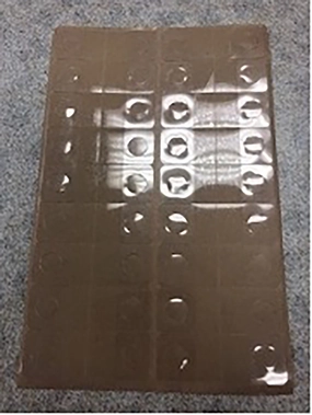 Merchandising Fixture - Adhesive Hang Tabs Sheet 975230